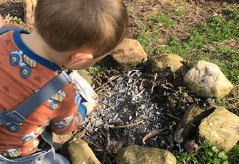 Boy and firepit