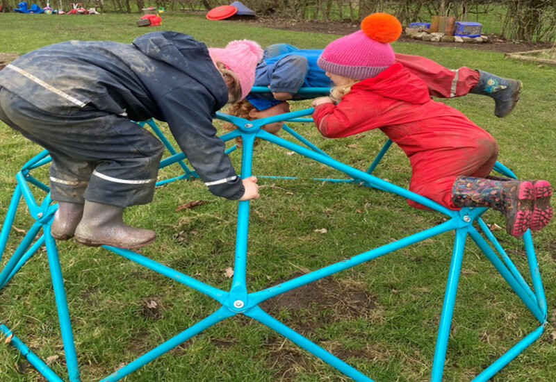 children on climbing frame