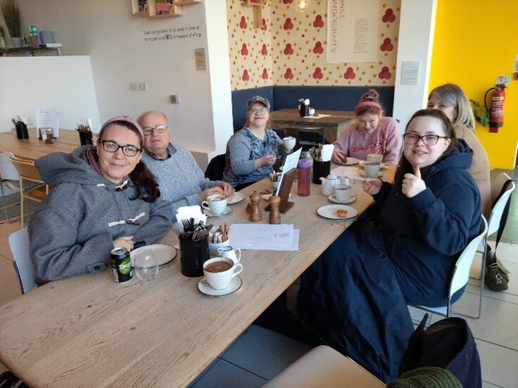 gathering of people around a table